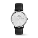 Classic Day Display Sheffield Silver watch featuring a brushed stainless steel case, white dial with subtle triangle pattern, day and date display, and a black genuine leather strap.