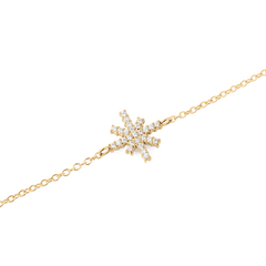 Close-up of the Mirelle Star Bracelet Gold, showcasing its fine gold chain and central star-shaped charm encrusted with sparkling white cubic zirconia crystals.