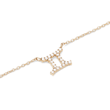 Close-up of the Crystal Zodiac Chain Necklace Gold featuring a Gemini pendant adorned with sparkling hand-set crystals on a fine gold-plated chain.