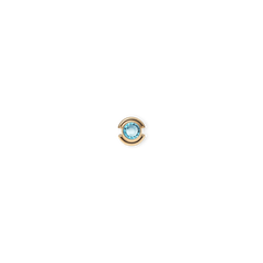 Gold charm featuring a turquoise blue crystal birthstone set in a minimal, circular gold-plated stainless steel design.