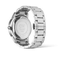Back view of the Daniel Wellington Iconic Paradigma Link Black Enamel watch, highlighting the engraved stainless steel case back and robust silver metal bracelet with polished and brushed links.