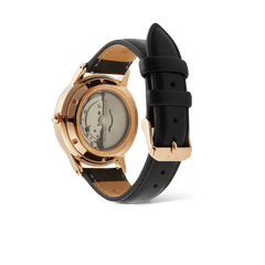 Rear view of the Daniel Wellington Iconic Sheffield Automatic Rose Gold watch, highlighting the exhibition case back with visible automatic movement and black leather strap.