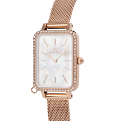 Close-up of the Quadro Crystal Zodiac Melrose watch featuring a rectangular rose gold case with a crystal-set bezel, mother of pearl dial, and a refined rose gold mesh strap.