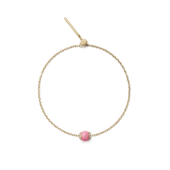 Delicate gold bracelet featuring a Rhodonite Crystal Orb Gold Charm with a soft pink semi-precious stone and sparkling crystal accents, finished with an adjustable clasp.