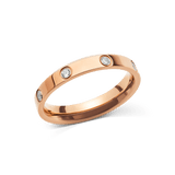 Rose gold 4mm ring crafted from stainless steel with a polished finish, featuring eight evenly spaced cubic zirconia crystals for a refined, minimalist look.