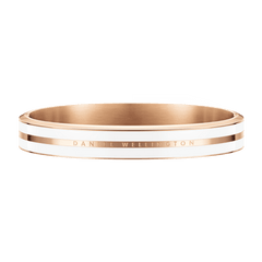 Rose gold bracelet with a satin white enamel inlay and Daniel Wellington engraving, featuring a smooth, contemporary bangle style.