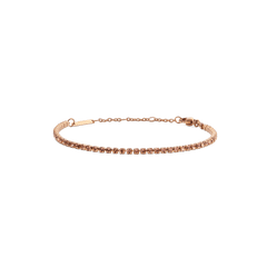 Slim rose gold tennis bracelet featuring a row of apricot-coloured Preciosa crystals, with an adjustable chain and secure lobster clasp for a refined, elegant finish.