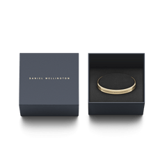Daniel Wellington Elan Bracelet Gold presented in an elegant dark gift box, highlighting its polished gold finish and engraved branding, ideal for gifting or special occasions.