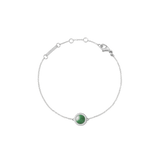 Silver bracelet with adjustable chain, featuring a domed jade charm encircled by white cubic zirconia crystals.
