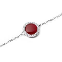 Close-up of Audrey Bracelet featuring a domed red agate stone framed by white cubic zirconia on a polished silver chain.