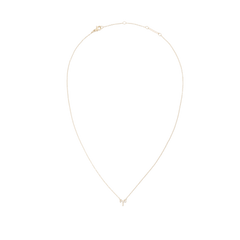 Slim gold chain necklace with an Aries zodiac pendant adorned with sparkling crystals.