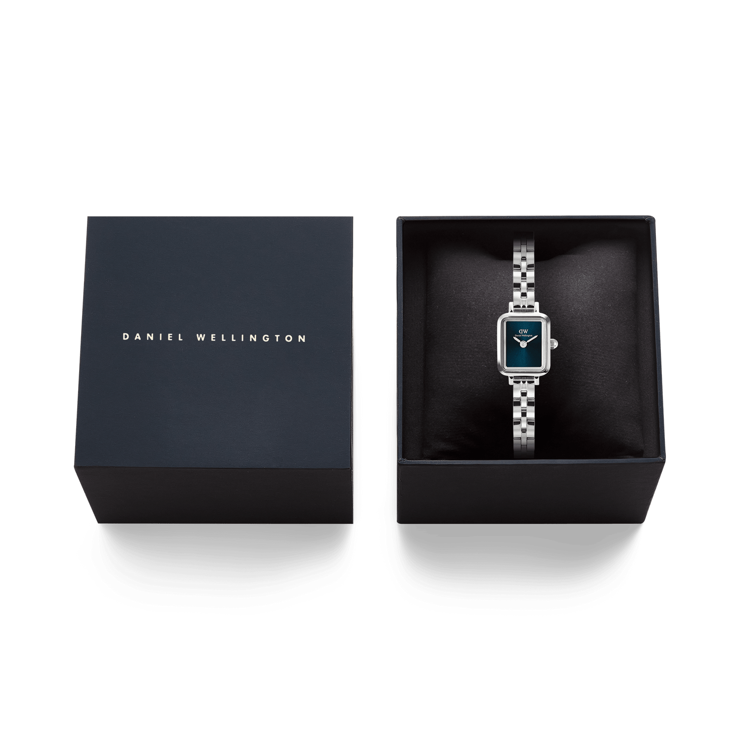 Quadro Mini Arch 3-link Arctic Sunray Silver women’s watch presented in an elegant Daniel Wellington gift box, featuring a rectangular stainless steel case and deep blue sunray dial.