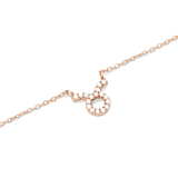 Rose gold chain necklace featuring a Taurus zodiac pendant adorned with sparkling hand-set crystals.