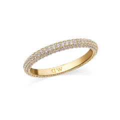 Gold pavé ring with a slim 3 mm band, featuring three rows of sparkling white cubic zirconia crystals and an engraved Daniel Wellington logo on the inner band.