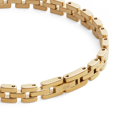 Detail view of the 3-Link Bracelet Gold, showcasing its polished gold-plated links and subtle engraved branding on the clasp.