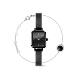 Quadro Mini & Audrey Black Set featuring a sleek rectangular black dial watch with a fine black mesh strap, paired with a delicate silver bracelet adorned with a black circular charm and crystal accents.