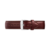 Brown genuine leather watch strap with a polished silver pin buckle, subtle edge stitching, and a tapered design, suitable for Daniel Wellington timepieces.
