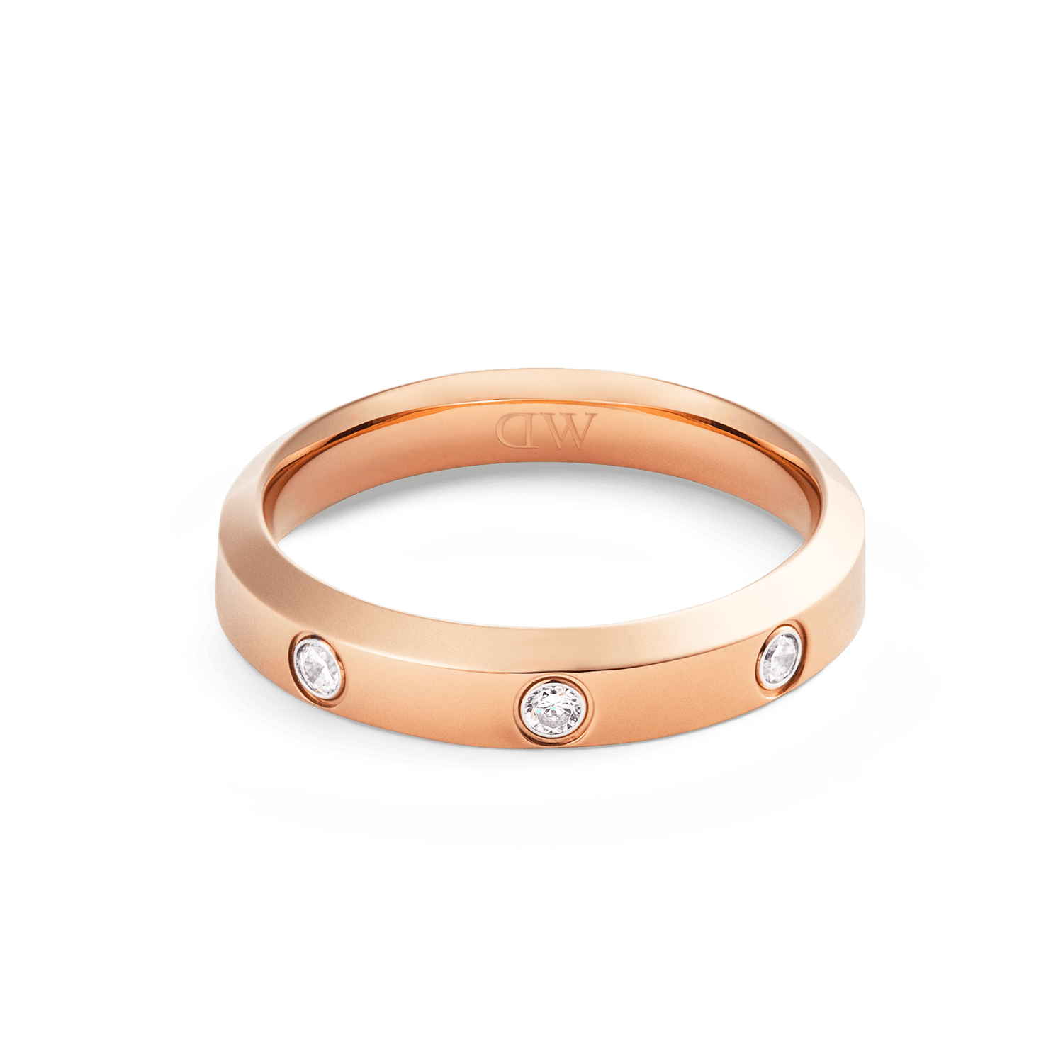 Classic Lumine Ring in rose gold with a 4mm band, featuring three bezel-set cubic zirconia crystals and a smooth, polished finish.