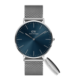 Daniel Wellington Classic Mesh Arctic watch with a blue sunray dial, minimalist silver hour markers, stainless steel mesh strap, and matching engraved Elan ring.