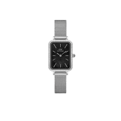 Sterling silver rectangular women’s watch with black mother of pearl dial, crystal bezel, and mesh strap by Daniel Wellington.