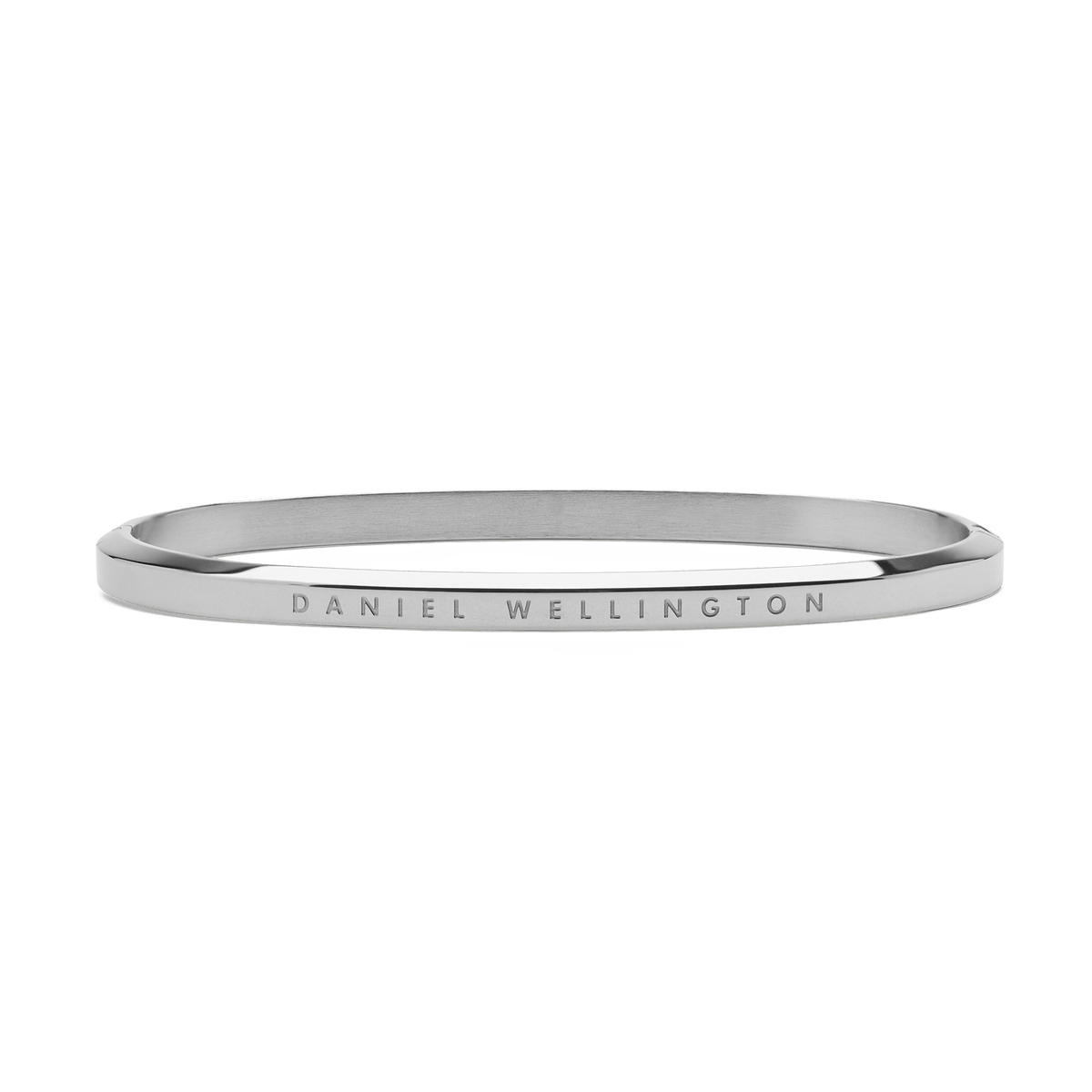 Sleek silver Daniel Wellington Classic Bangle crafted from polished stainless steel, featuring a minimalist design with subtle engraved branding along the outer edge.