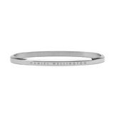 Sleek silver Daniel Wellington Classic Bangle crafted from polished stainless steel, featuring a minimalist design with subtle engraved branding along the outer edge.