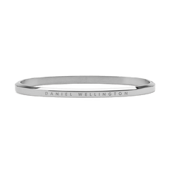 Sleek silver Daniel Wellington Classic Bangle crafted from polished stainless steel, featuring a minimalist design with subtle engraved branding along the outer edge.