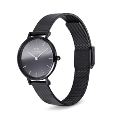 Daniel Wellington Petite Reflection Black watch with a real mirror glass dial, minimalist silver markers, and a fully polished black mesh strap with clasp buckle, shown at an angle to highlight its refined design.
