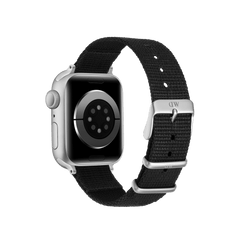 Smartwatch with a silver case and black recycled polyester NATO strap, featuring Daniel Wellington branding on the silver buckle and loops.