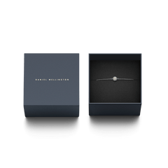 Pavé Crystal Pendant Bracelet Silver displayed in an open Daniel Wellington gift box with the matching branded lid beside it.