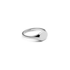 Classic Mini Signet Ring Silver with a smooth, round engraveable face and a polished 316L stainless steel band, shown from a side angle to highlight its minimalist design.