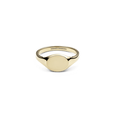 Polished gold-tone mini signet ring with a smooth, flat oval face and minimalist design, crafted from stainless steel with a warm PVD gold finish.