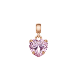 Heart-shaped pink crystal charm set in a rose gold-plated stainless steel frame, featuring a delicate claw setting and an adjustable clasp for easy attachment to bracelets or necklaces. The soft pink cubic zirconia sparkles, creating an elegant and romantic jewellery accent.
