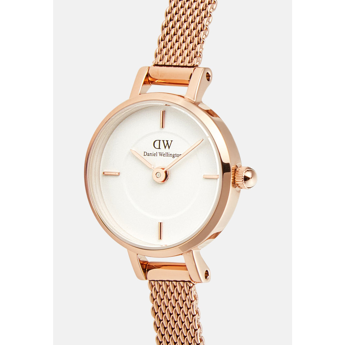 Close-up of the Petite Mini Melrose women’s watch, highlighting the white minimalist dial, rose gold 19mm case, and fine mesh strap with polished detailing.