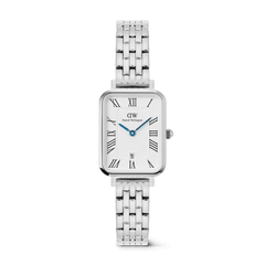Rectangular silver women’s watch with a five-link stainless steel bracelet, white dial featuring bold Roman numerals, blue hands, and a date window at six o’clock. The polished case and guilloché patterned centre create an elegant, timeless look.