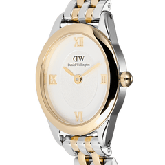 Close-up of Daniel Wellington Ophelia Mini Two Tone Gold watch with oval gold-silver case and Roman numeral sunray dial.