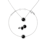 Silver jewellery set featuring a necklace, bracelet, and stud earrings, each with a round black agate centre surrounded by a halo of white crystals and set on fine silver chains. The pieces have a modern, minimalist design, ideal for both everyday wear and special occasions.