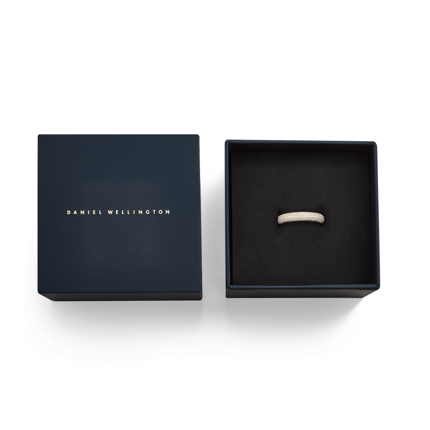 Pavé Ring Gold 5 mm presented in an elegant navy Daniel Wellington gift box, highlighting the gold band set with sparkling white cubic zirconia crystals.
