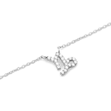Silver chain necklace featuring a Capricorn zodiac pendant adorned with hand-set sparkling crystals.