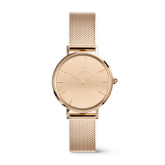 Rose gold women’s watch with a minimalist round face, mirror glass dial, and an adjustable mesh strap, featuring a sleek and elegant design by Daniel Wellington.