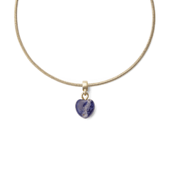 Gold snake chain necklace featuring a heart-shaped blue spot stone charm with natural veining, set in gold PVD-plated stainless steel for a refined, elegant look.