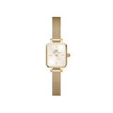 Quadro Mini Evergold Champagne women’s watch with gold mesh strap and rectangular champagne sunray dial by Daniel Wellington.