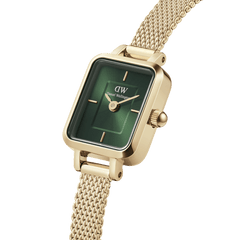 Daniel Wellington Quadro Mini Evergold Emerald watch with gold mesh strap and rectangular emerald green sunray dial.