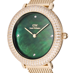 Close-up of Crystalline Bezel Evergold Green watch with gold mesh strap, green mother-of-pearl dial, and sparkling crystal bezel.