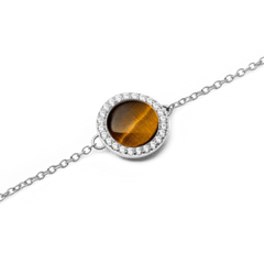 Close-up of Audrey Bracelet Tiger Eye Silver featuring domed tiger eye stone and cubic zirconia halo on a fine silver chain.