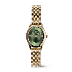 Gold women’s watch with an oval emerald green sunray dial, polished gold Roman numerals, and a refined link bracelet, designed for a comfortable fit on smaller wrists.