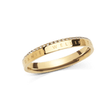 Slim gold ring with a polished finish, featuring a single row of white cubic zirconia crystals along the chamfered edge and the Daniel Wellington engraving on the band.