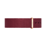 Roselyn Strap Rose Gold features a deep ruby red polyester NATO strap with an elegant rose gold buckle, designed for Daniel Wellington watches and suitable for both men’s and women’s styles.