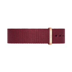 Roselyn Strap Rose Gold features a deep ruby red polyester NATO strap with an elegant rose gold buckle, designed for Daniel Wellington watches and suitable for both men’s and women’s styles.