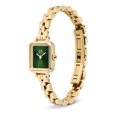 Quadro Mini Arch 3-link Emerald Sunray Gold watch featuring a rectangular gold-tone case, emerald green sunray dial, and an open arched 3-link bracelet with a butterfly clasp, shown from a side angle.